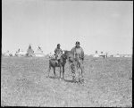 F530b. Wife of Red Fox With Daughter on Pony.
