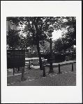 (Homomonument sign, boat, canal, figure at right-Amsterdam)