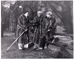 David Finnie (class of 1951 Law), William M. Throop (class of 1950 Law), and James T. Milles (class of 1950 Law) wearing racoon coats to a Yale football game.