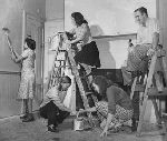 Veterans and wives preparing their apartments for use, 1940s.