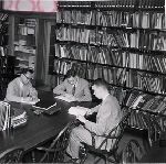 Students studying in the library of the Yale University Bureau of Highway Traffic.