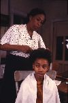 Starletta Dubois styling Ylonda Powell's hair in August Wilson's "The Piano Lesson" at the Yale Repertory Theatre, 1987-1988.
