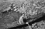 Anne Morrow Lindbergh learning to kayak in Hollsteinborg, Greenland.