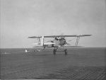 Charles A. Lindbergh taking off from aircraft carrier "Saratoga." 1928.