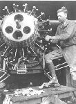 Charles A. Lindbergh checking the motor of the "Spirit of St. Louis," May 1927.