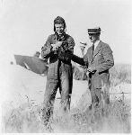 Charles A. Lindbergh after jumping from a plane he tested for a friend. Lambert Field, St. Louis. June 2, 1925.