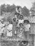 African-American children with wheel.