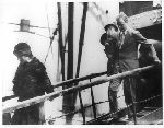 Charles A., Anne Morrow and Jon Lindbergh arriving in Liverpool, England.