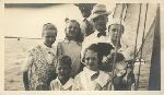 Anne Morrow Lindbergh on a boat with her father and others.