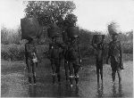 Congonese women carrying baskets.