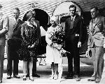 Anne Morrow Lindbergh, Mary Pickford, and Charles A. Lindbergh at inaugural flight of the first coast-to-coast air service in Los Angeles.