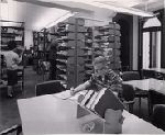 Helen Lin, Frank Spooner, and Charles Westover in a Yale Library reading room.