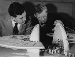 Bliss Woodruff (left), Yale student in architecture, and Louis I. Kahn (right), Philadelphia architect and Yale faculty member, look over a classroom model of a theoretical headquarters for UNESCO.