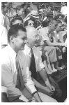 Edward H. Hume and Leslie watching a tennis match at Forest Hills in Queens, New York.