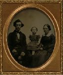 Crosby H. Wheeler (1823-1896) and Susan Anna (Brookings) Wheeler (1827-1917) with child